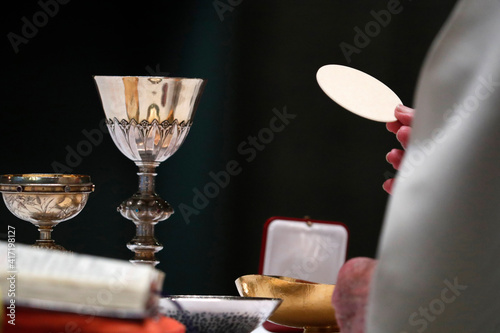 The Visitation Monastery.  Catholic mass.  Eucharist celebration.  Close-up.  Marclaz. France.  22.03.2018 photo