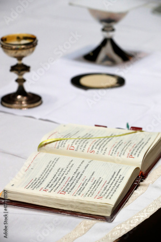 Catholic mass. Open Roman missel on altar.  France.  22.03.2018 photo