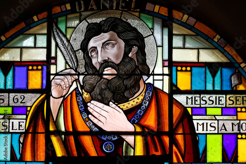 Stained glass window.  Daniel is the hero of the biblical Book of Daniel. Taninges. France. 22.03.2018 photo