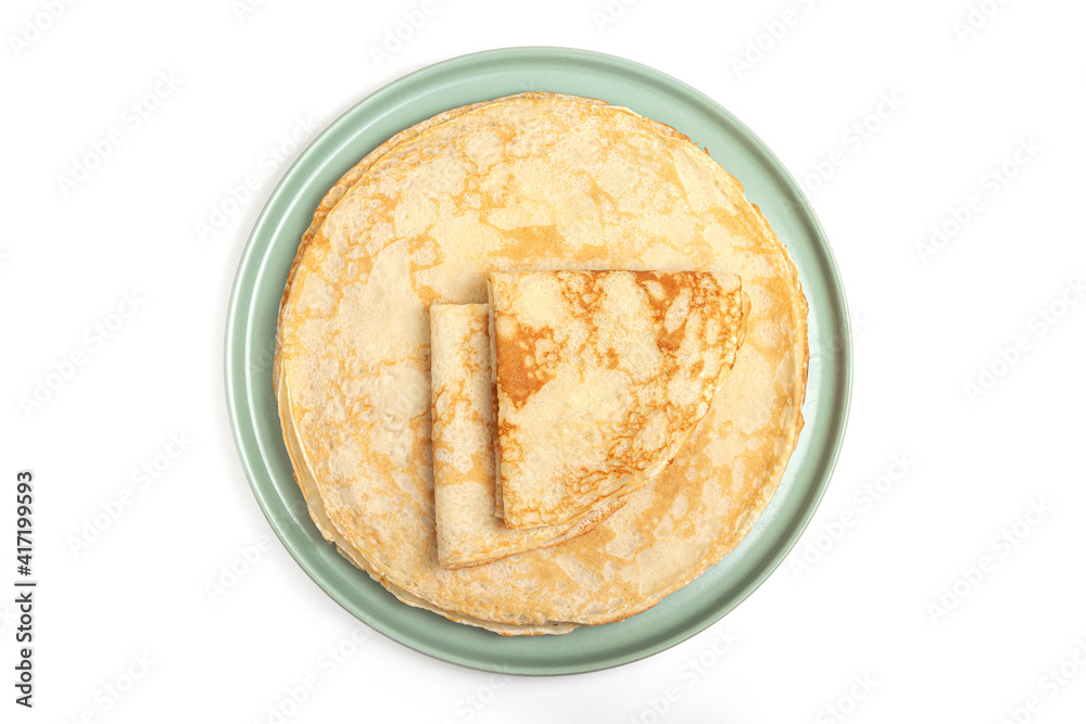 Pancake on the green plate on white background Pancake on the green plate on white background