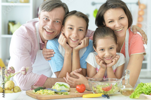 Cute family cooking together in kitchen