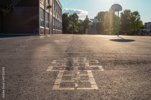 School building and school yard in the evening