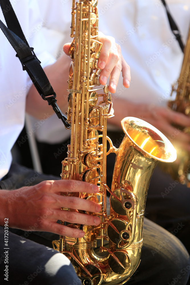 Obraz premium Faucigny music festival. Brass band musicians. Saxophone. Saint-Gervais. France. 18.07.2016