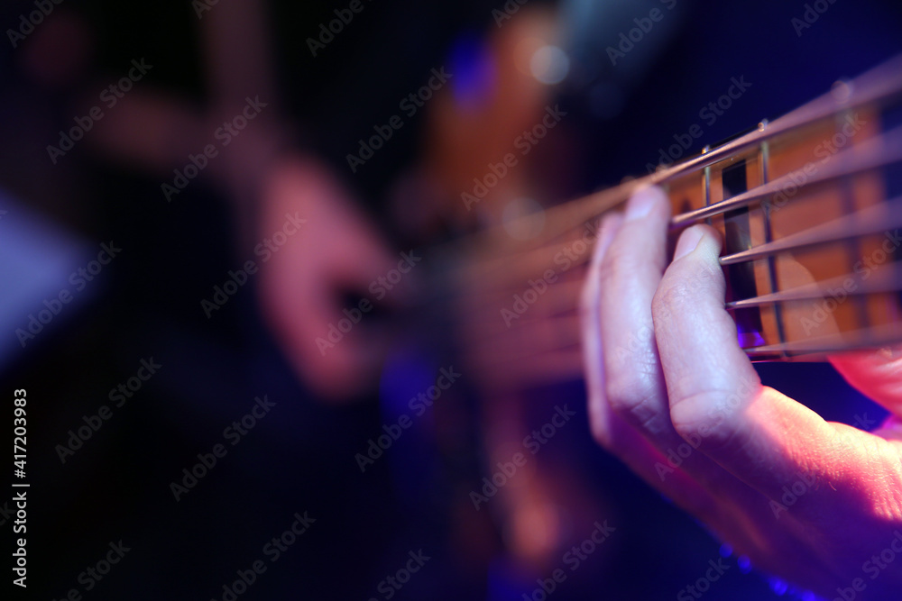 Concert. Bass player. Close-up. France. 14.12.2016 Concert. Bass player. Close-up. France. 14.12.2016