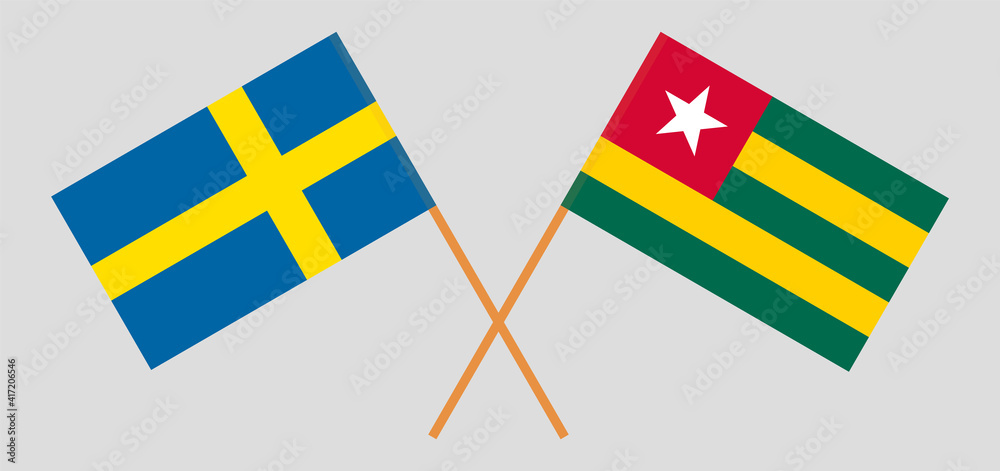 Crossed flags of Sweden and Togo. Official colors. Correct proportion