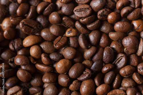 Roasted arabica coffee beans background. Background with coffee. 