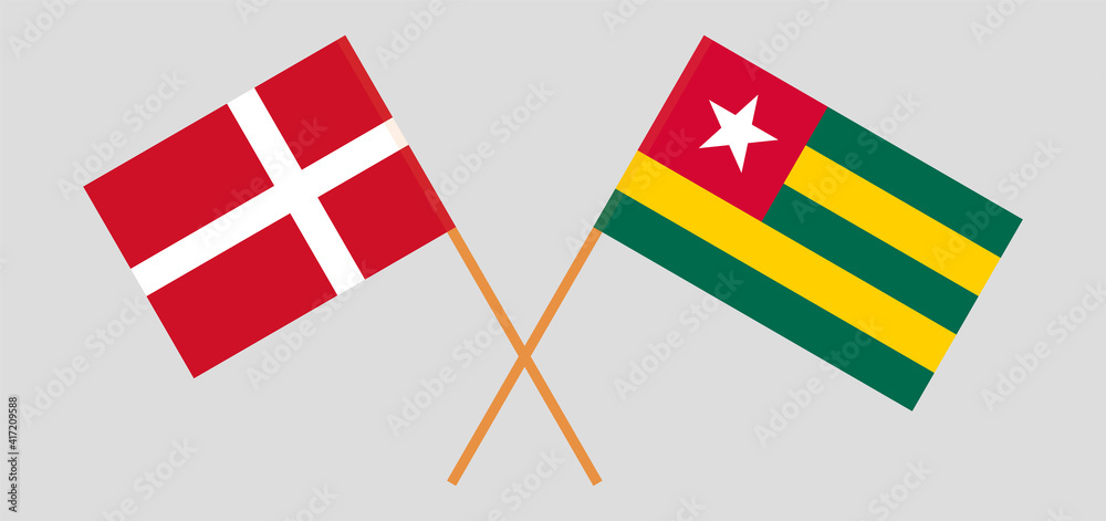 Crossed flags of Denmark and Togo. Official colors. Correct proportion
