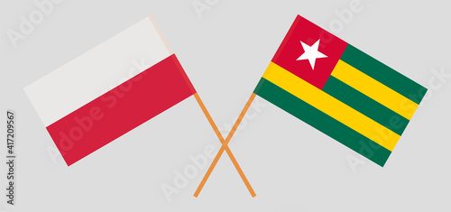 Crossed flags of Poland and Togo. Official colors. Correct proportion