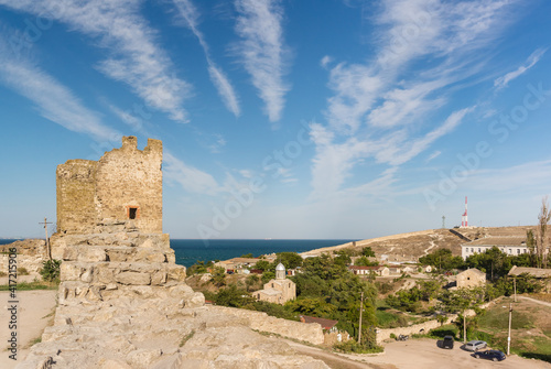 View from the wall of the ancient Genoese fortress of Kafa to the temple of the Iver Icon of the Mother God on the Black Sea coast. Popular tourist attraction of the city photo