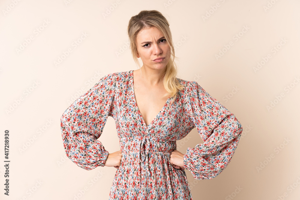 Blonde woman over isolated background angry Blonde woman over isolated background angry