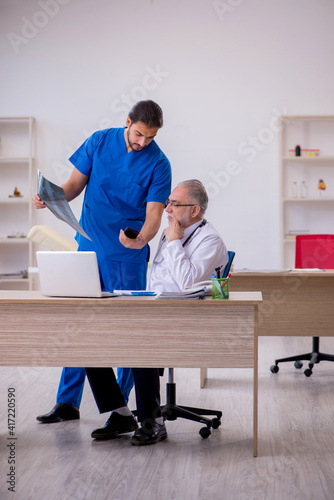 Two doctors working in the clinic