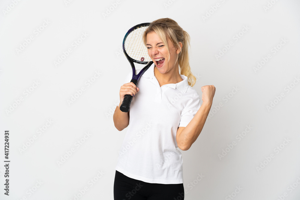 Young Russian woman tennis player isolated on white background celebrating a victory Young Russian woman tennis player isolated on white background celebrating a victory