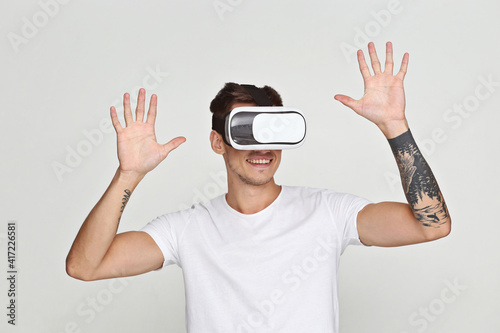 The man with glasses of virtual reality on white isolated background.