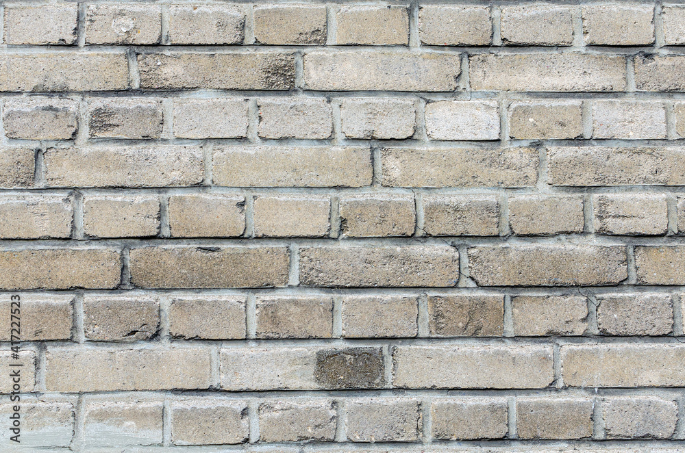 an old brown brick wall. background