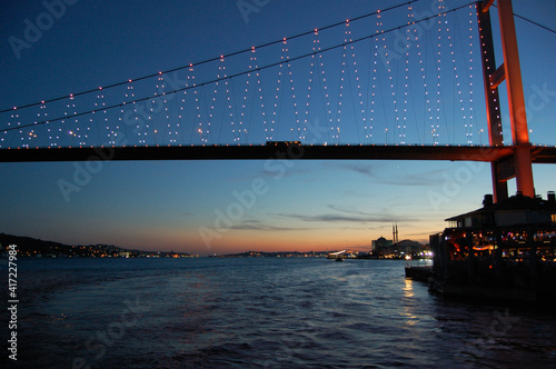 Istanbul (Turkey). Night cruise on the Bosphorus. Golden Horn. Sunset. photo