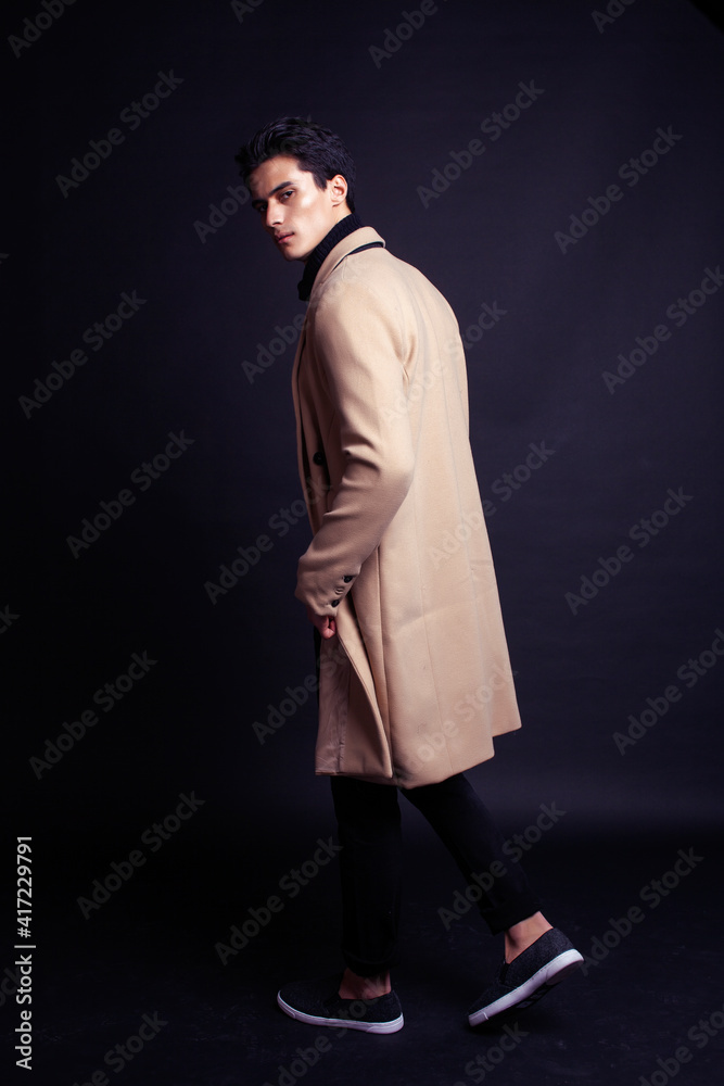 handsome asian fashion looking man posing in studio on black background, lifestyle modern people concept handsome asian fashion looking man posing in studio on black background, lifestyle modern people concept