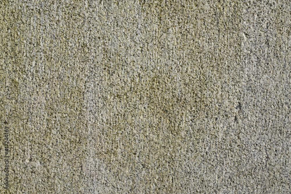 Fototapeta premium A wall of granite stone as a background.