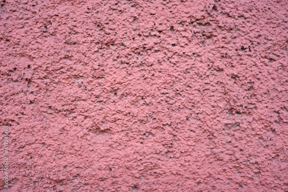 Fototapeta premium Painted pink vintage wall as a background.