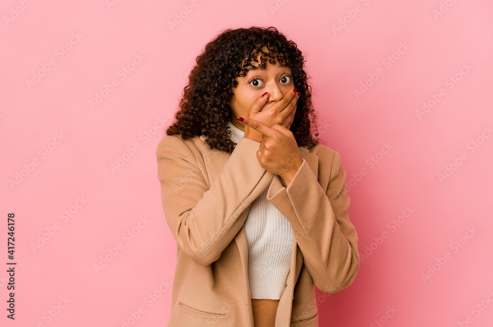 Young african american afro woman isolated pointing to the side Young african american afro woman isolated pointing to the side