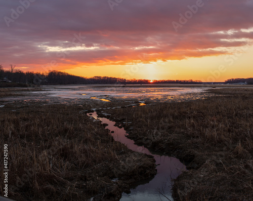 Sunrise Over the Partly Frozen River