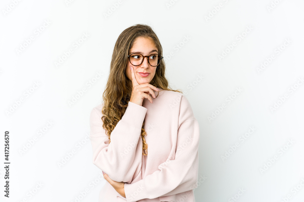Young caucasian woman contemplating, planning a strategy, thinking about the way of a business. Young caucasian woman contemplating, planning a strategy, thinking about the way of a business.