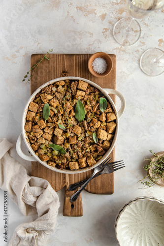 Focaccia stuffing dish with fresh herbs photo