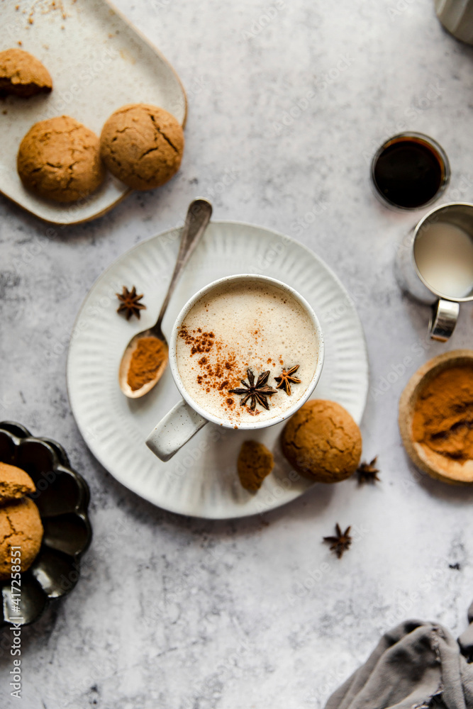 Gingerbread latte with gingersnap cookie. Gingerbread latte with gingersnap cookie.