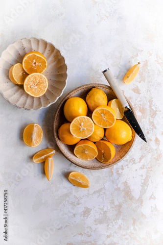 Sliced meyer lemons on a plate