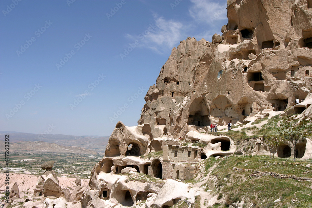 Uchisar Castle and special stone formation of Cappadocia in Nevsehir, Turkey. Cappadocia is part of the UNESCO World Heritage Site.