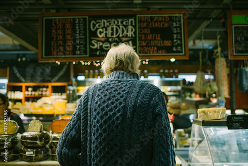 Photography Old man at St. Lawrence Market in downtown Toronto, Canada