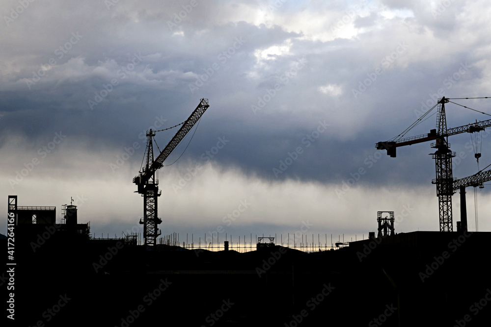 building site with raining cloud