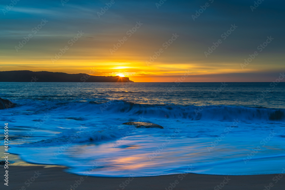 High Cloud Sunrise Seascape with Soft Shades of Colour
