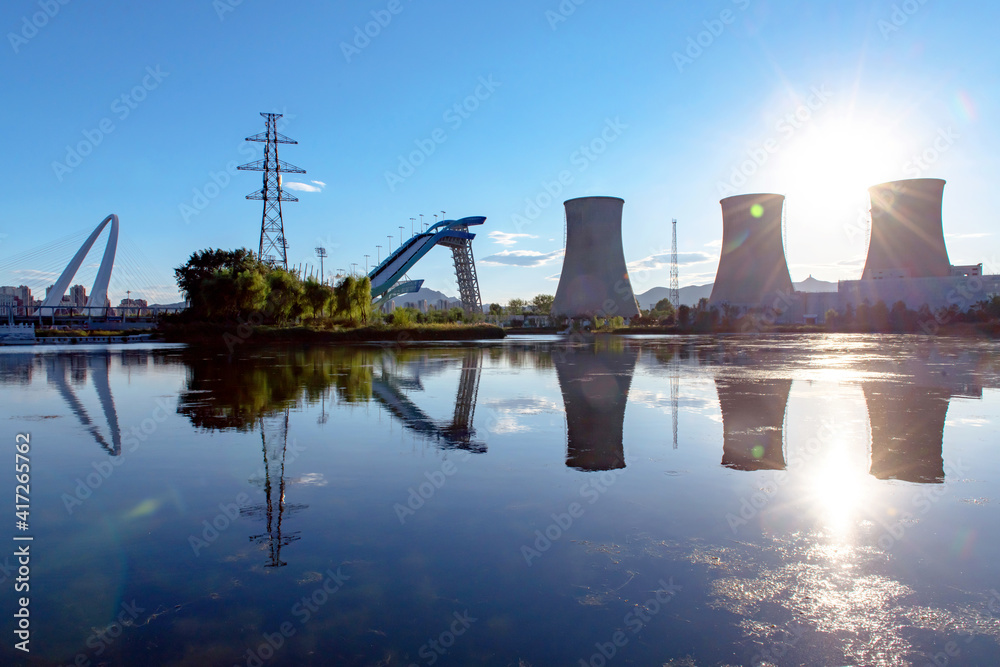 Naklejka premium chimney tower with reflection