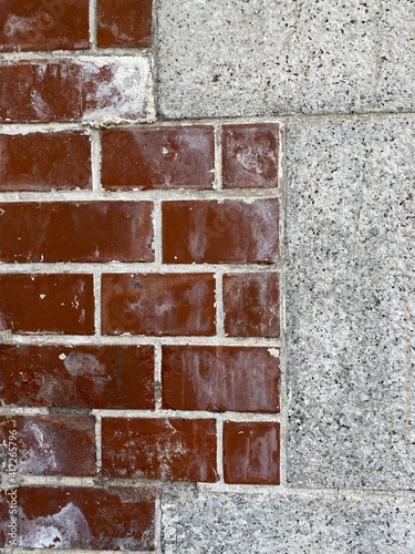 The walls of a Japanese building constructed of brick and stone.