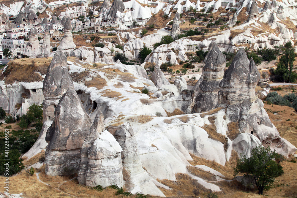 Naklejka premium Special stone formation behind the district of Goreme at Cappadocia in Nevsehir, Turkey. Cappadocia is part of the UNESCO World Heritage Site.