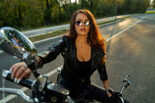 Closeup shot of attractive motorcycle rider girl 