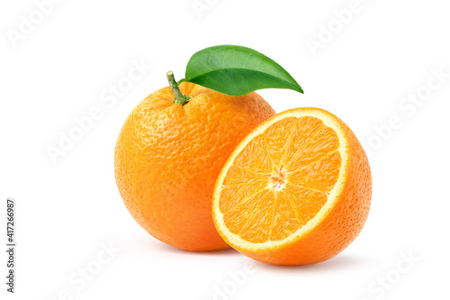 Orange with cut in half and green leaf isolated on white background. clipping path.