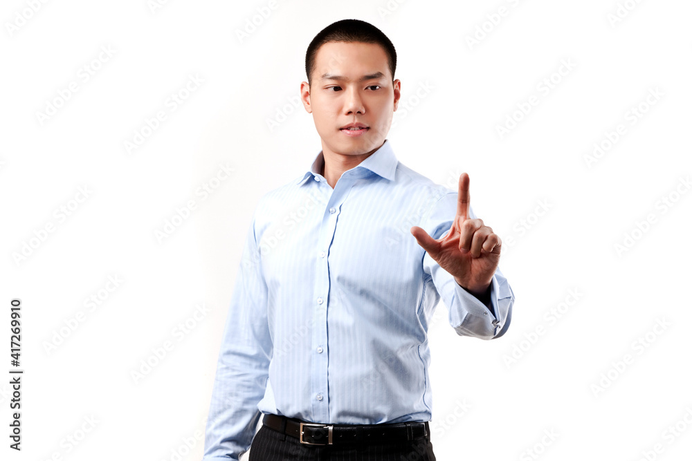 Business man touching an imaginary screen Business man touching an imaginary screen