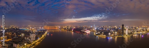 wuhan light show.Panoramic skyline and buildings beside yangtze river. © AS_SleepingPanda