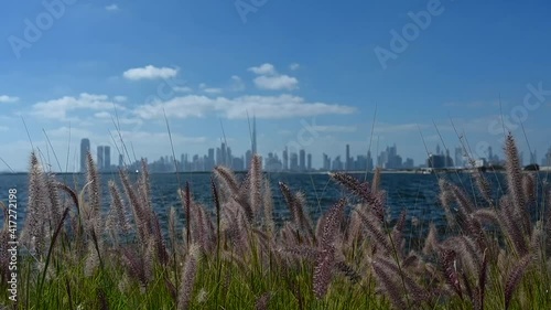 Something of Dubai city skyline from the creek harbour on a beautiful bright sunny day in the United Arab Emirates.  photo