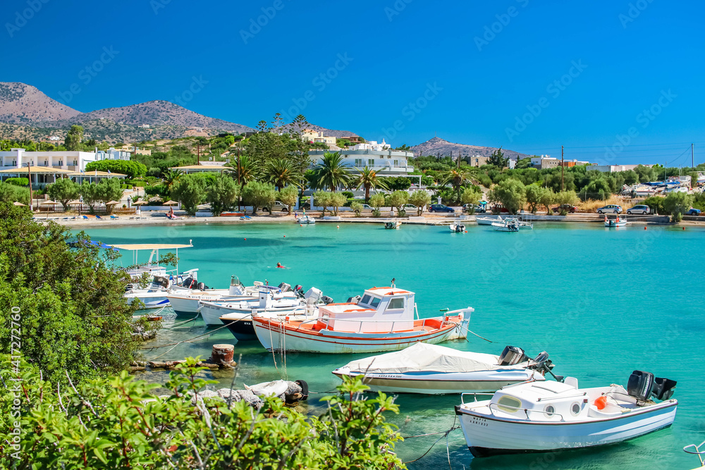 Boats in Beautiful Beach Port in Lasithi Crete Greece