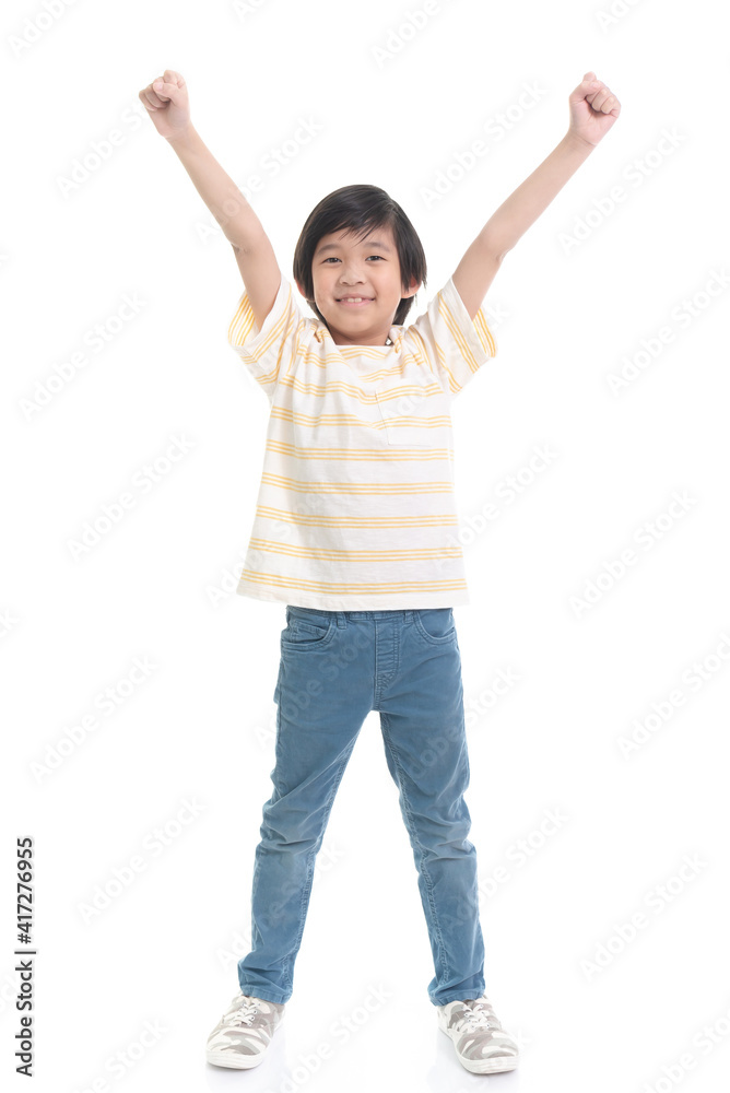 Cute Asian child showing winner sign on white background isolated Cute Asian child showing winner sign on white background isolated