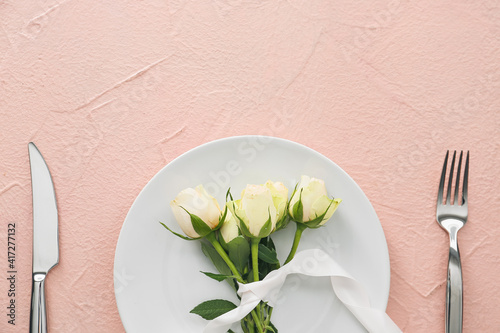 Beautiful table setting on color background