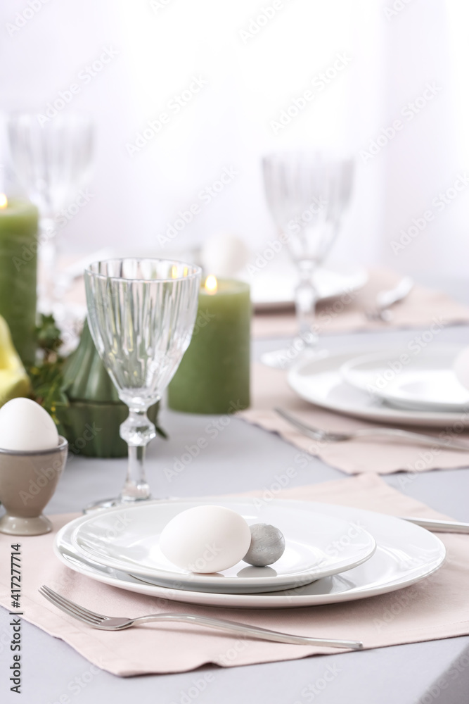 Beautiful table setting for Easter celebration Beautiful table setting for Easter celebration