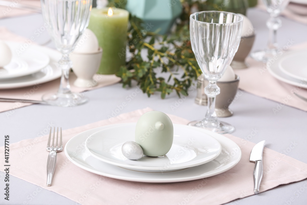 Beautiful table setting for Easter celebration Beautiful table setting for Easter celebration