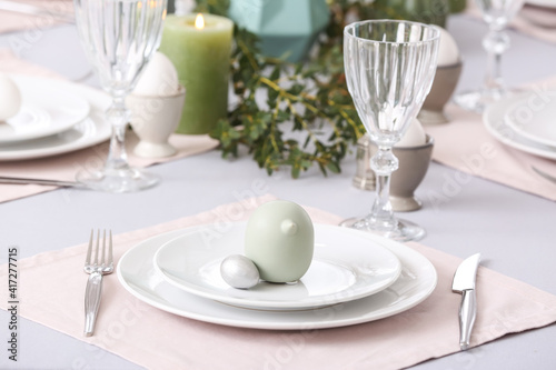 Beautiful table setting for Easter celebration © Pixel-Shot