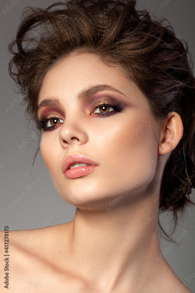 Portrait of beautiful woman with evening makeup Portrait of beautiful woman with evening makeup