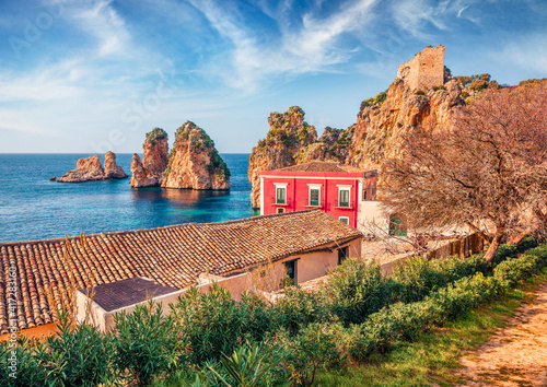 Landscape photography. Sunny spring scene of Tonnara di Scopello. Sunny landscape of Sicily, Italy, Europe. Wonderful morning seascape of Mediterranean sea. Traveling concept background. photo