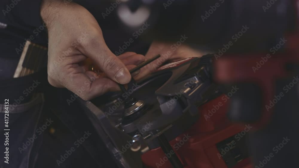 Carpenter Replacing Circular Saw Blade Carpenter Replacing Circular Saw Blade