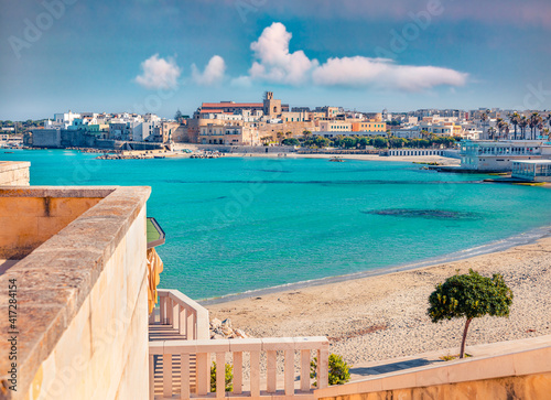Fototapeta Naklejka Na Ścianę i Meble -  Сharm of the ancient cities of Europe. Coastal town in southern Italy’s Apulia region - Otranto, Apulia region, Italy, europe. Popular Alimini Beach on background. Traveling concept background.